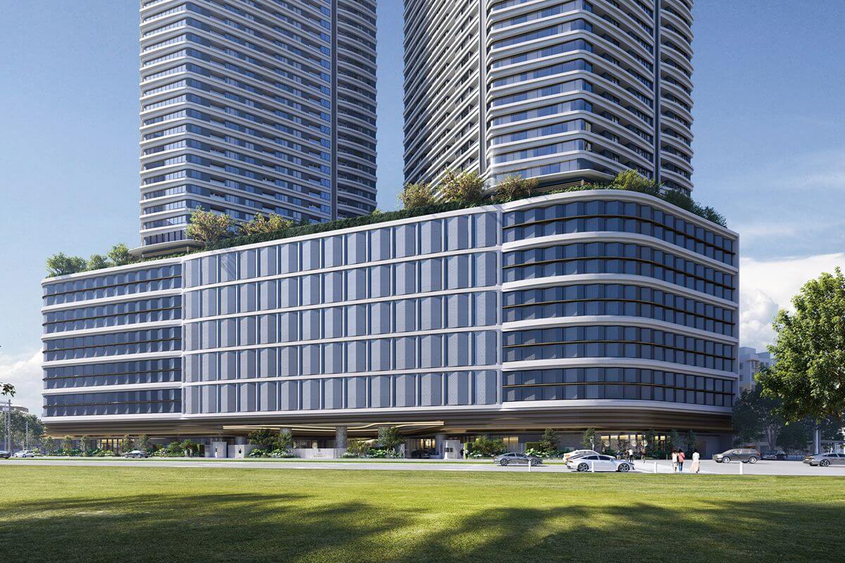 Artist’s rendering of Shang Summit’s twin towers and landscaped podium viewed from a green open space