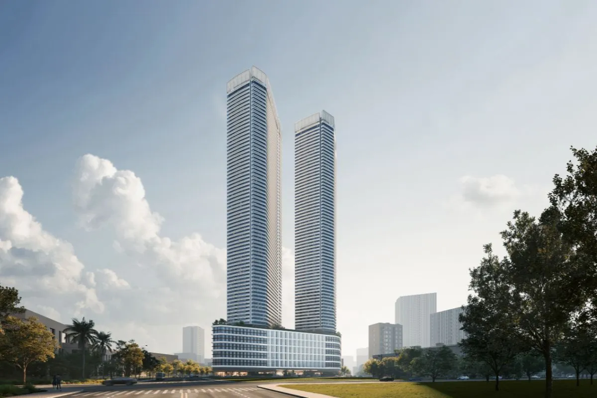 Exterior view of Shang Summit’s twin high-rise towers surrounded by landscaped city greenery