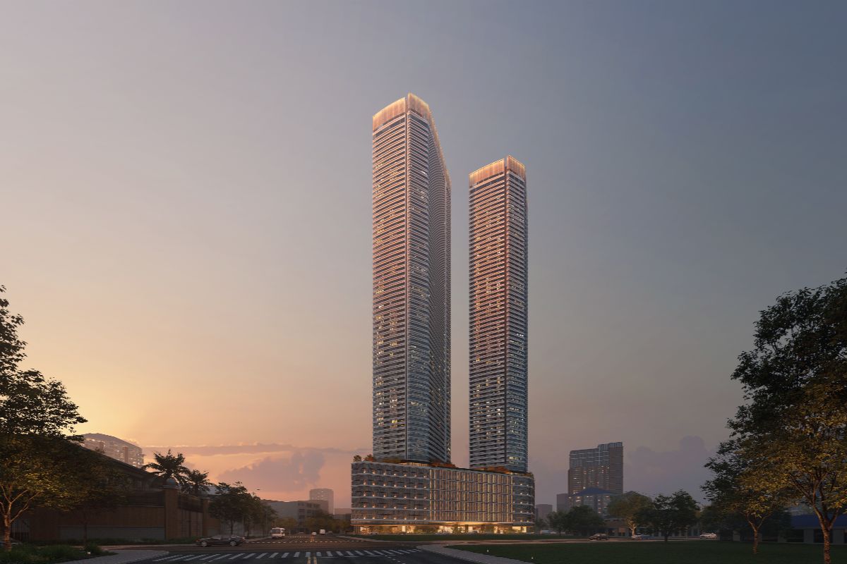 Shang Summit twin residential towers at sunset in a landscaped city setting