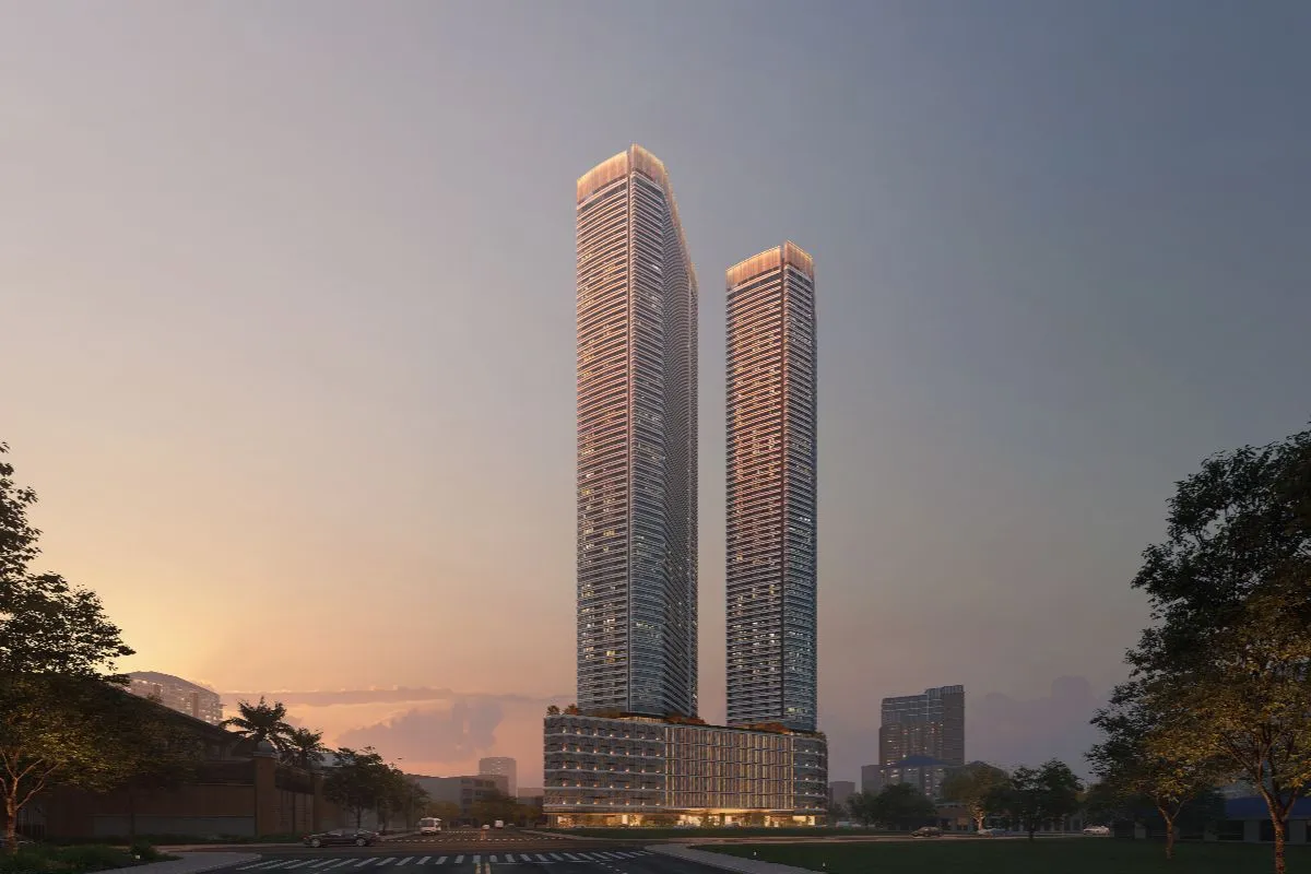 Shang Summit twin residential towers at sunset in a landscaped city setting
