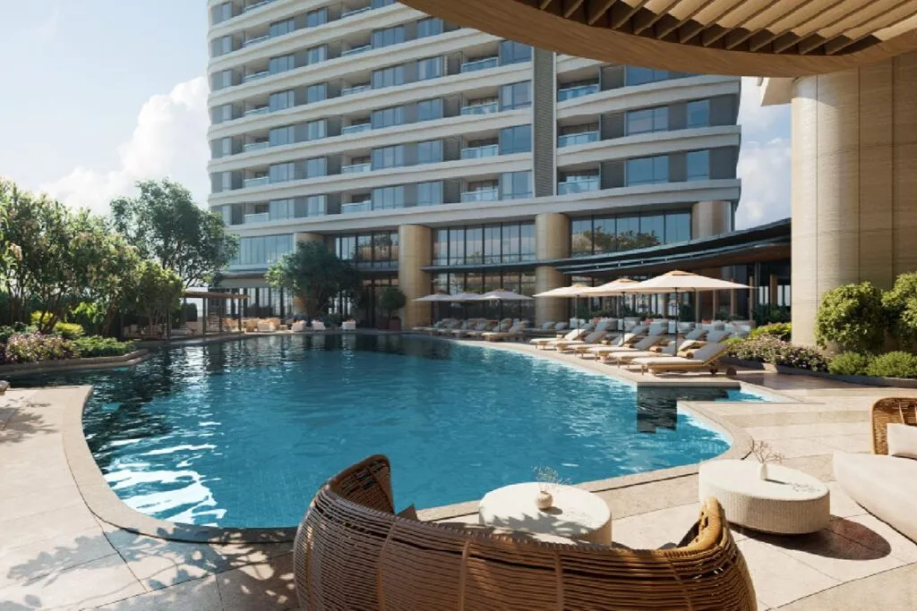 Resort-style swimming pool and outdoor amenities in a modern luxury condominium