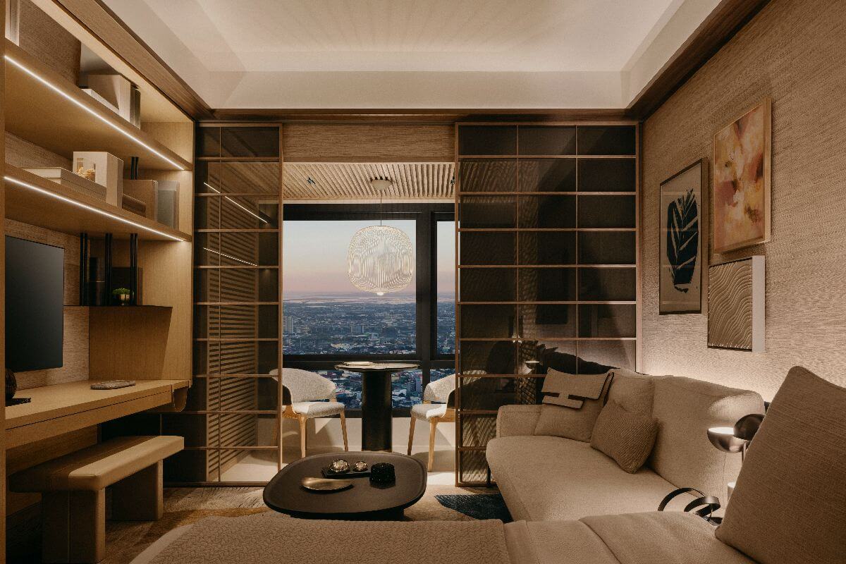Luxury condominium living room with warm wood finishes, textured walls, sliding partitions, and a city view at dusk