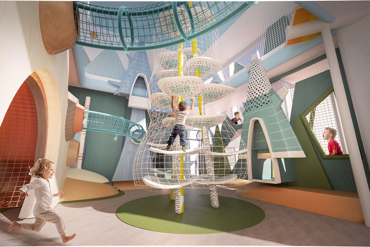 Children exploring a colorful condominium playground with climbing structures and interactive play areas