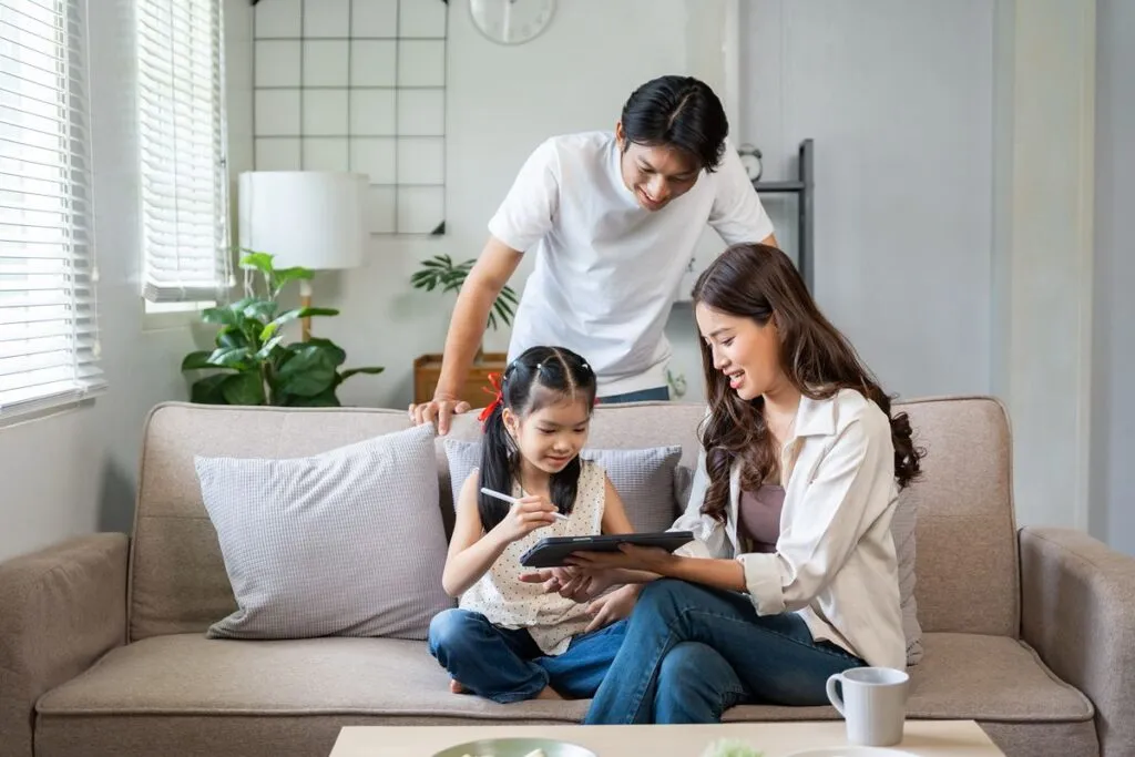Multi-generational family enjoying time together in a premium luxury condominium residence