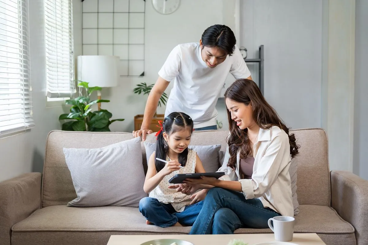 Multi-generational family enjoying time together in a premium luxury condominium residence