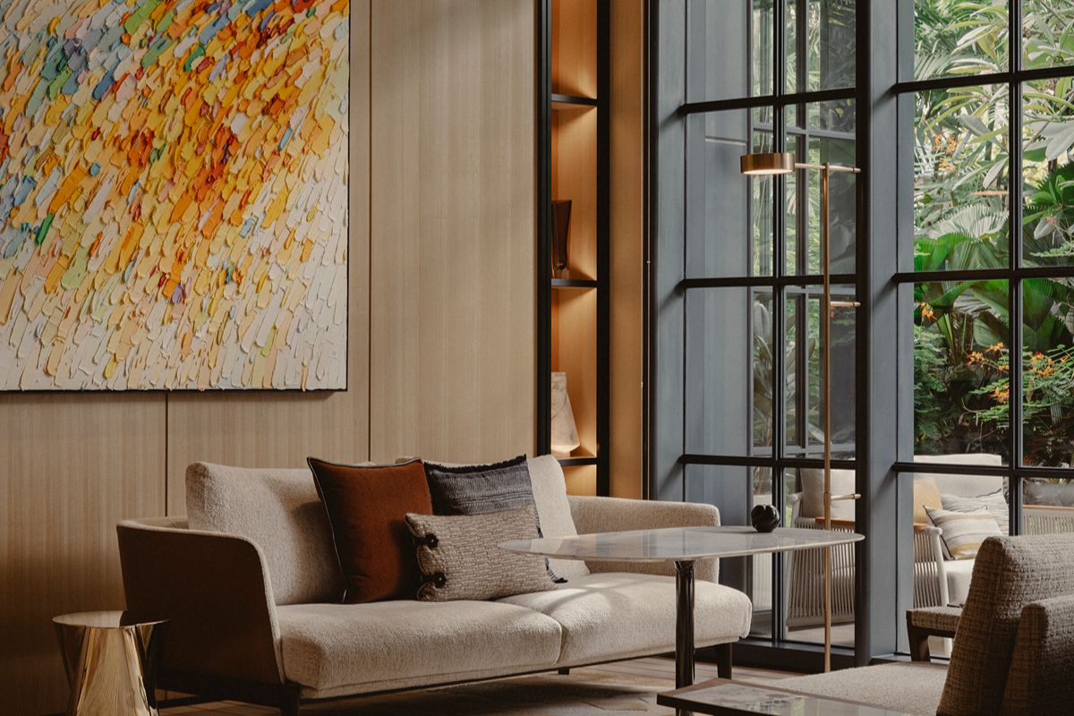 Shang Summit residential lounge with contemporary seating and floor-to-ceiling windows.